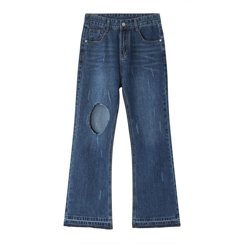 Flared casual denim trousers with holes